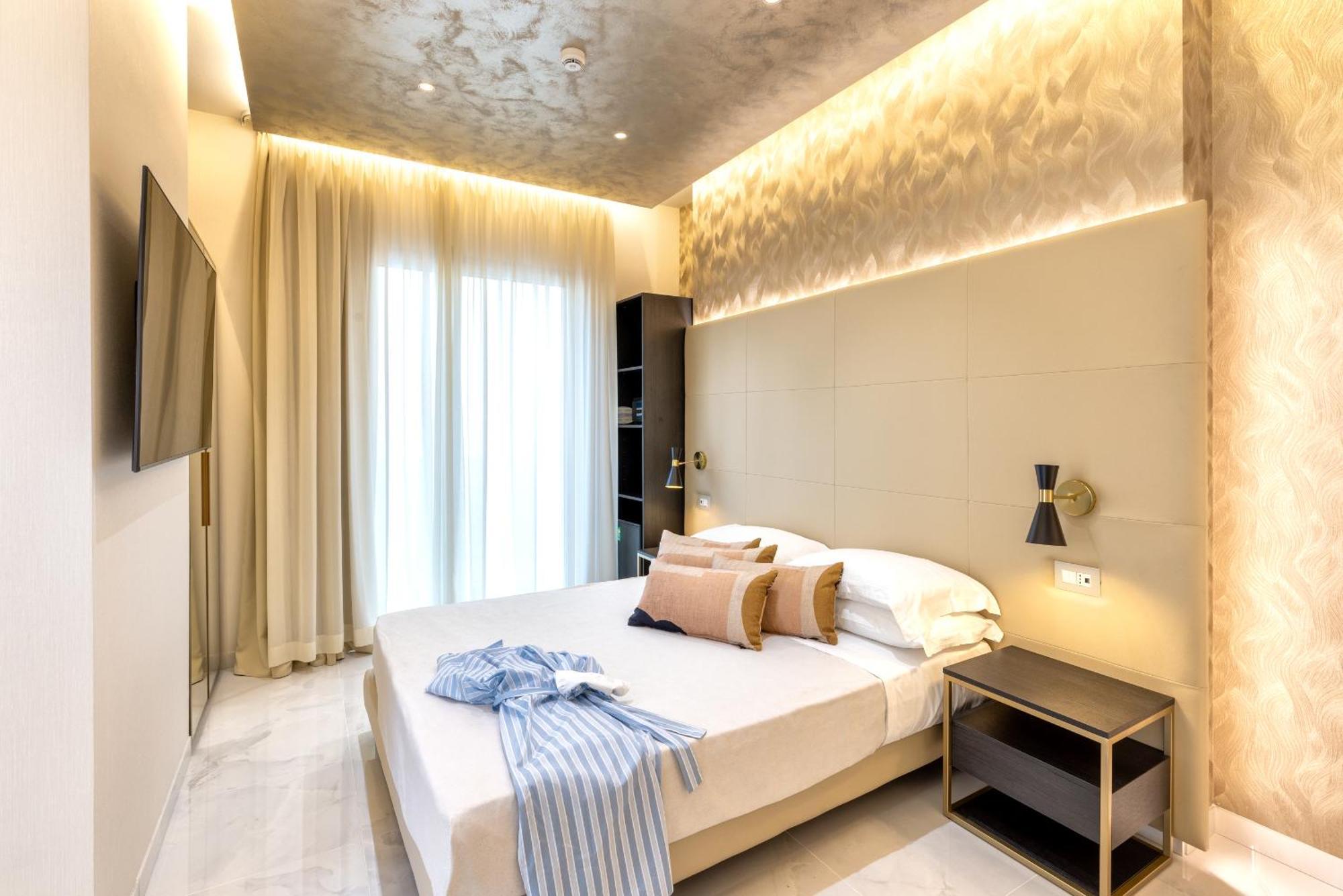 Hotel Mondial Римини Экстерьер фото